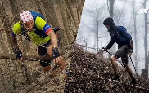 Dwóch biegaczy pokonuje trudny teren podczas Barkley Marathon. Jeden wspina się po drzewach, drugi używa kijków.